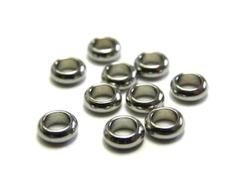 Perline distanziatrici in acciaio inossidabile rotonde medie da 5 mm con foro grande - 10 o 50 pezzi