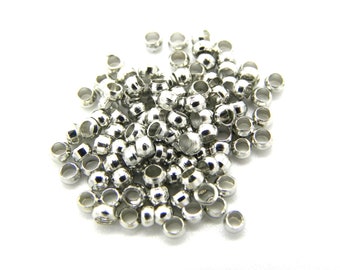 Mittelgroße Quetschperlen, Crimp-Perlen aus Edelstahl - 2  mm - Platinsilber od. vergoldet - 1 g (ca. 100 St.)