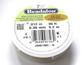May include: A spool of 7-strand satin gold beading wire, 30 feet long, with a 0.012 inch diameter. The spool is labeled "Beadalon" and has a barcode and a QR code.
