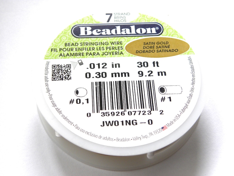 Beadalon 7-strand nylon-coated stainless steel wire. o.46 mm in satin gold color