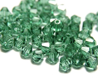 Perles toupies à facettes MC de cristaux supérieurs tchèques de 4 mm - Vert tourmaline (24, 48 ou 72 perles)