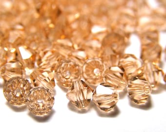 4 mm Czech Superior Crystals MC Faceted Bicone Beads - Light Peach
