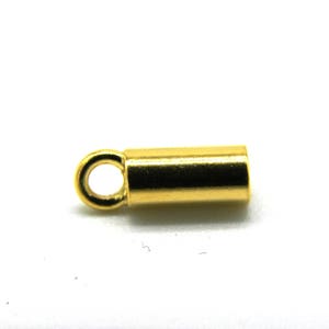 May include: Gold-toned metal end cap with a small loop. The end cap is cylindrical in shape.