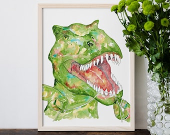 Könnte beinhalten: Ein Aquarellbild eines grünen Dinosauriers mit offenem Maul, das seine Zähne zeigt. Der Dinosaurier hält ein grünes Blatt im Maul. Das Bild ist in einem hellen Holzrahmen gerahmt.