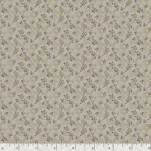 May include: A light beige fabric featuring a repeating pattern of small, delicate sprigs with dark blue berries and muted green leaves. A white ruler is visible at the bottom edge, showing measurements in inches from zero to eight inches.