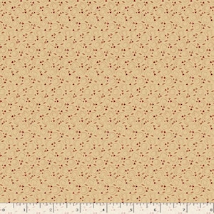 May include: Tan fabric with a repeating pattern of red dotted circles and small red triangles. The fabric has a subtle texture and is suitable for quilting or crafting projects. The pattern is evenly spaced across the material.