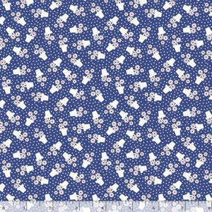 May include: A dark blue fabric featuring a repeating pattern of small white potted flowers and tiny white polka dots. A white measuring tape with black markings is visible along the bottom edge, showing a length of eight inches.