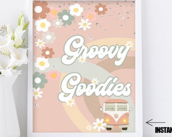 May include: A framed print with the words "Groovy Goodies" in a retro font, featuring a vintage van and floral accents. The artwork is in soft pastel colors, with a rainbow and daisy details. The print is 8x10 inches.