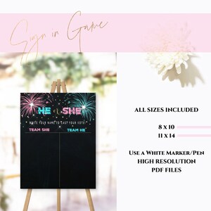 May include: A black chalkboard sign on a wooden easel with the text "HE or SHE" in pink and teal, with fireworks illustrations. The sign includes the text "WRITE YOUR NAME TO CAST YOUR VOTE!" and "TEAM SHE" and "TEAM HE".