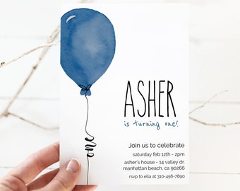 May include: A blue watercolor balloon with a string that says "one" on it. The text "ASHER is turning one!" is written in black. The invitation also includes details for a birthday party: date, time, address, and RSVP information.
