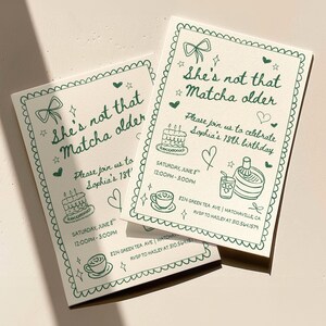 May include: Two cream-colored invitation cards with green text and illustrations. The text reads "She's not that Matcha older" and invites guests to Sophia's 18th birthday. Includes a cake, tea cup, and matcha illustrations.