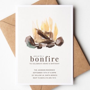 May include: Bonfire invitation card featuring a watercolour illustration of a bonfire in brown, yellow, and green hues. The text reads "Join us for a bonfire to celebrate Marc's birthday" with event details. Includes a brown envelope.