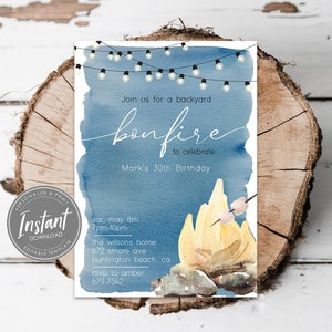 May include: A blue and white invitation for a backyard bonfire to celebrate a 30th birthday. The invitation features a watercolor background with string lights, a campfire, and a marshmallow on a stick. The text reads "Join us for a backyard bonfire to celebrate Mark's 30th Birthday. Sat, May 8th 7pm-10pm The Wilsons Home 672 Smore Ave Huntington Beach, CA RSVP to Amber 679-7542"