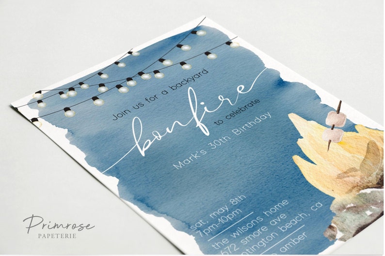 May include: A blue watercolor invitation with string lights and the text "Join us for a backyard bonfire to celebrate Mark's 30th Birthday". The invitation includes details for the event, including the date, time, and location.