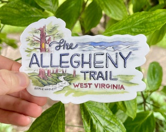 May include: A white sticker with a watercolor illustration of a forest scene with a stream and mountains in the background. The text "The Allegheny Trail West Virginia" is written in blue and red lettering. The artist's name, "Rosalie Haizlett", is written in small black lettering at the bottom.