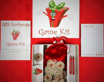 May include: A white box with a red velvet bag, wooden tokens, pencils, and instructions for a gift exchange game. The box has a red and green cartoon gift box character on the lid with the text "Gift Exchange Game Kit".