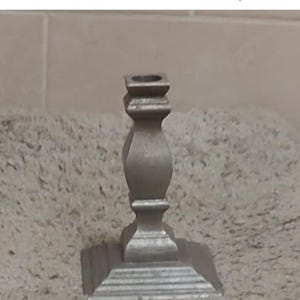 Candelabro de peltre