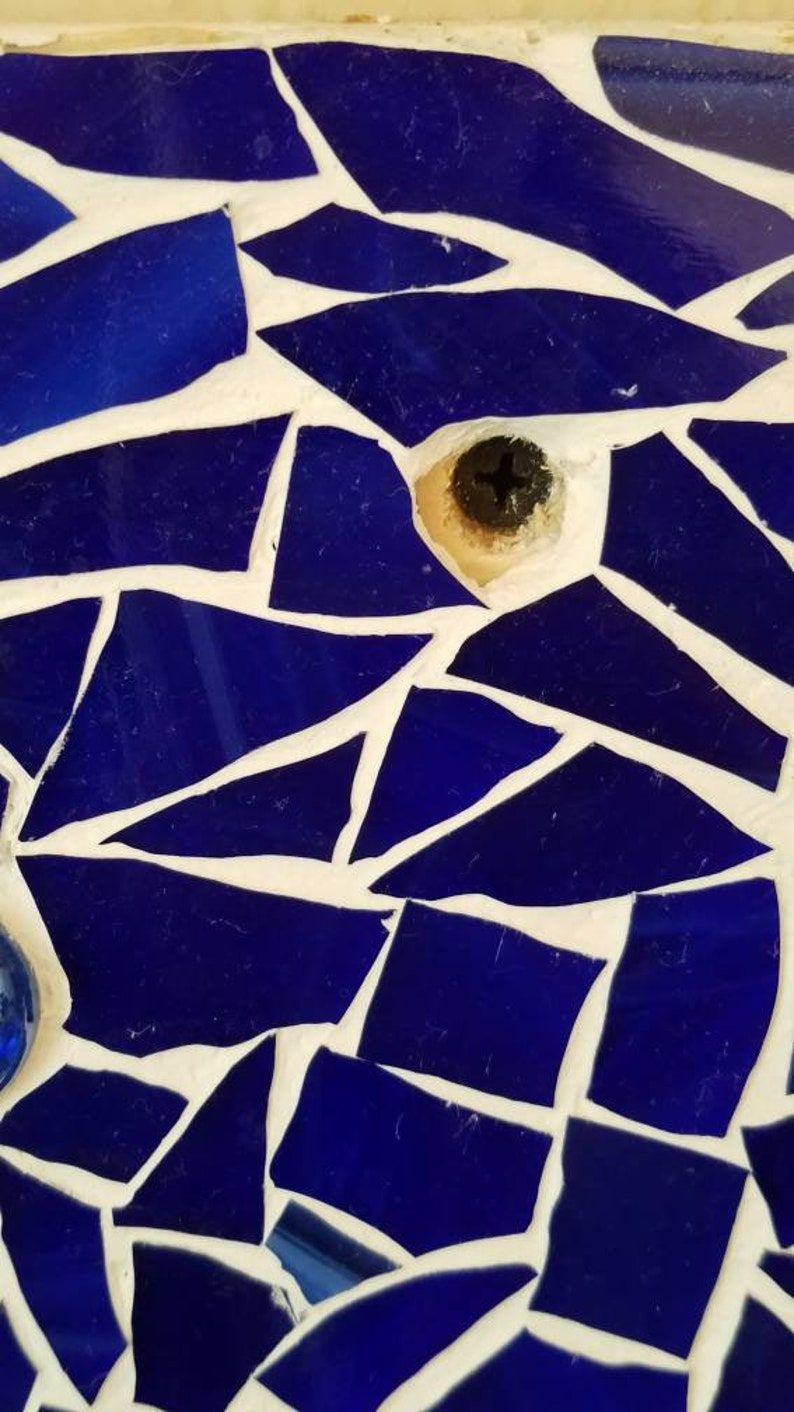Mushroom colored glass backsplash