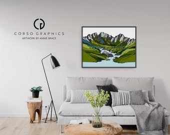 May include: A framed illustration of a mountain range with a river flowing through it. The mountains are drawn in shades of green, blue, and gray. The river is a light blue color. The artwork is titled "CORSO GRAPHICS ARTWORK BY ANNIE BRACE".