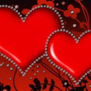May include: Two red hearts with a silver beaded border, set against a dark red background with silver glitter and floral designs.