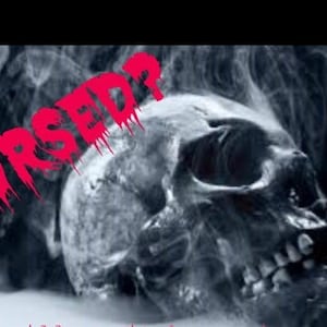 May include: A black and white skull with a red dripping text overlay that says "CURSED?" The skull is surrounded by smoke.