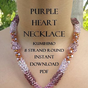 May include: Purple Heart Necklace Kumihimo 8 Strand Round Instant Download PDF. A close-up of a purple, pink and orange beaded necklace with a heart-shaped pendant.