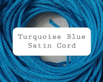 Cordon satiné 1 mm turquoise 8 brins de 1,5 m