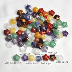 May include: Assortment of star-shaped gemstone beads in various colors, including amethyst, sodalite, tiger eye, green aventurine, yellow jade, red jasper, and clear quartz.