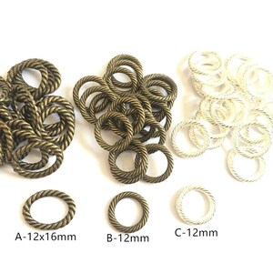 May include: Three sizes of twisted metal rings. The rings are in three colours: gold, bronze, and silver. The rings are labelled A-12x16mm, B-12mm, and C-12mm.