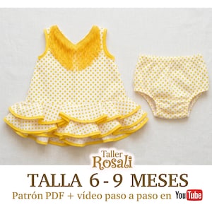 Puede incluir: Conjunto de bebé con un vestido sin mangas y una braguita a juego. El vestido es blanco con lunares amarillos, ribetes amarillos y un escote con flecos amarillos. El conjunto es para bebés de 6-9 meses.
