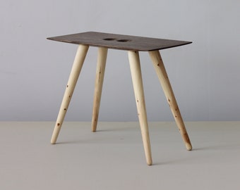 Small oak and juniper wood stool, Minimalist style bench with holes, Handmade one-of-a-kind gift, made in Latvia by Didzis Jurkovskis.