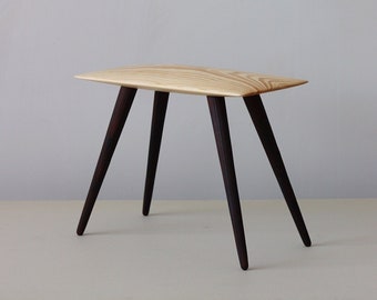 Unique wooden stool, Small minimalist-style bench with burned legs, Designed and handmade in Latvia by Didzis Jurkovskis.