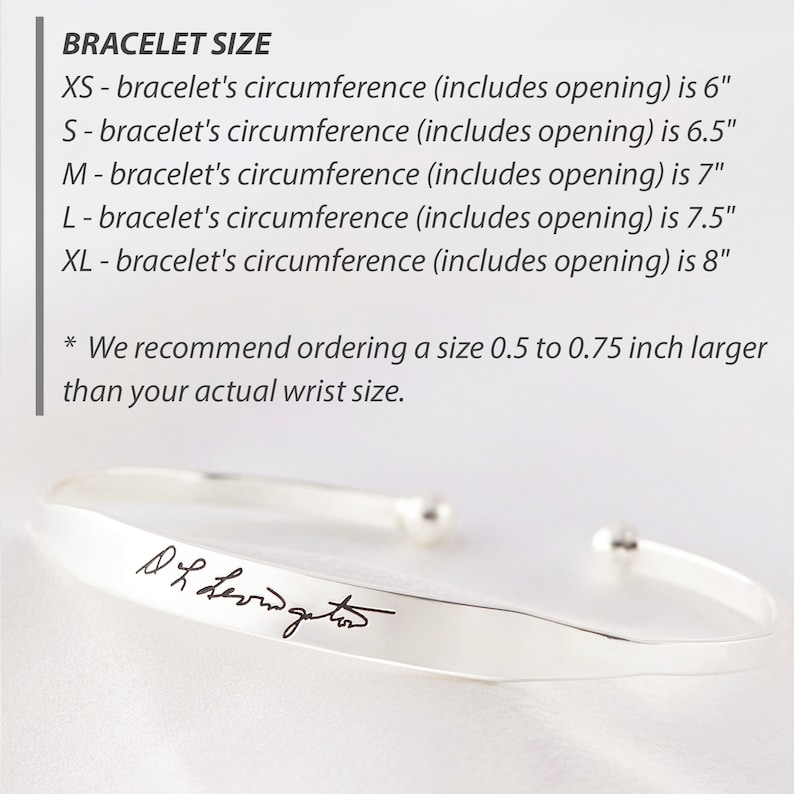 May include: A silver-colored cuff bracelet with a handwritten signature engraved on the front. The image includes a size chart listing circumferences from 6 inches for XS to 8 inches for XL, and a recommendation to order 0.5 to 0.75 inches larger.
