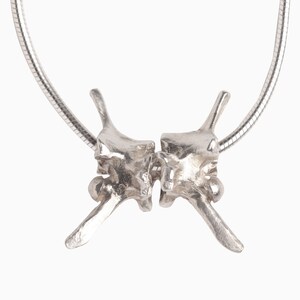 Benhalsband