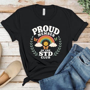 Proud Member STD Club Funny T-Shirt, Retro Rainbow Sunshine Butterfly Graphic Tee, Quirky Aesthetic Whimsical Gift for Her, Groovy Vibes Top