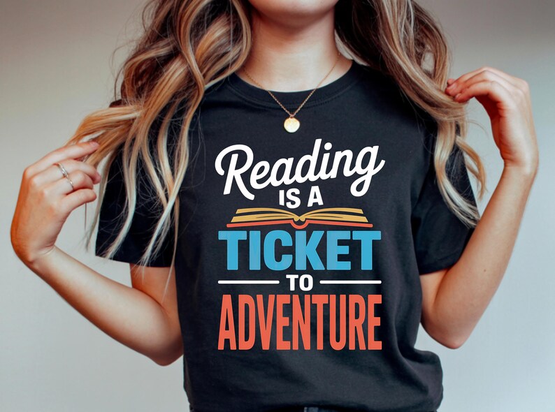 Black t-shirt with "Reading is a ticket to adventure" text.