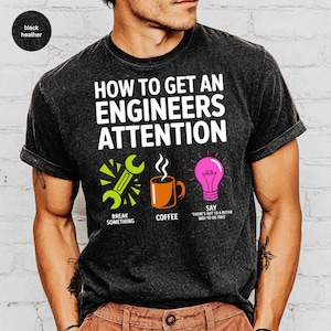 T-shirt with "How to Get an Engineer's Attention" and icons.