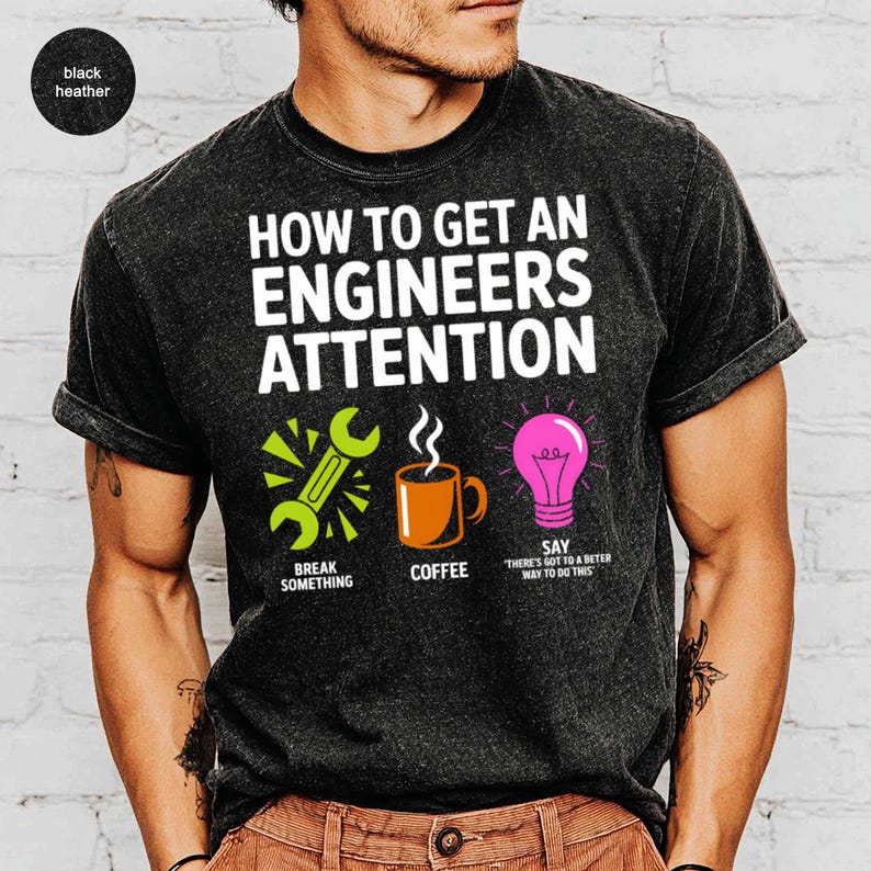T-shirt with "How to Get an Engineer's Attention" and icons.