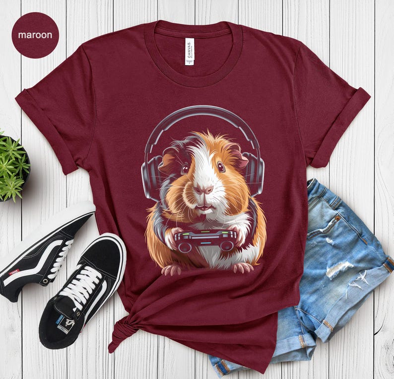 Guinea Pig Headphones T-Shirt, Cute Animal Graphic Tee, Funny Pet Lover Gift, Casual Maroon Top, Women’s Novelty Apparel
