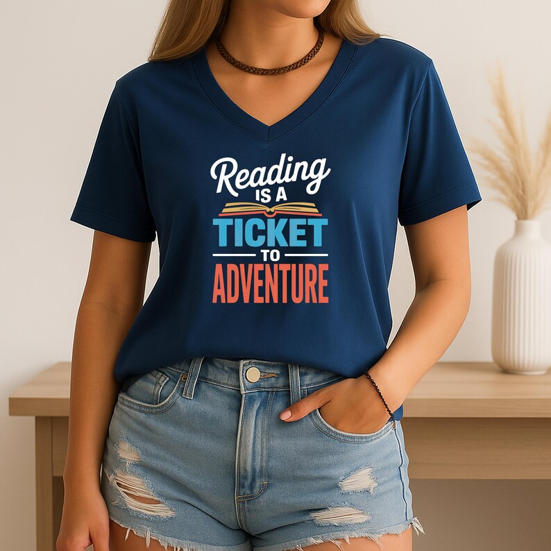 Navy v-neck t-shirt with "Reading is a ticket to adventure" text.