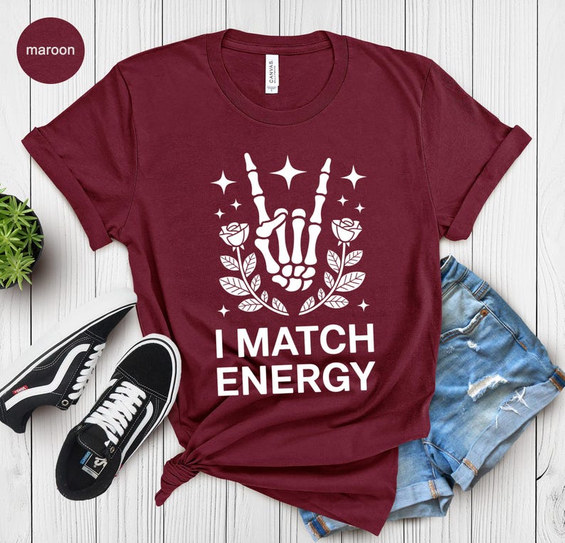 I Match Energy, Skeleton Hand Rock On, Rose Graphic Tee, Witchy Aesthetic, Empowering Vibes, Trendy Goth Design, Dark Art Print
I Match