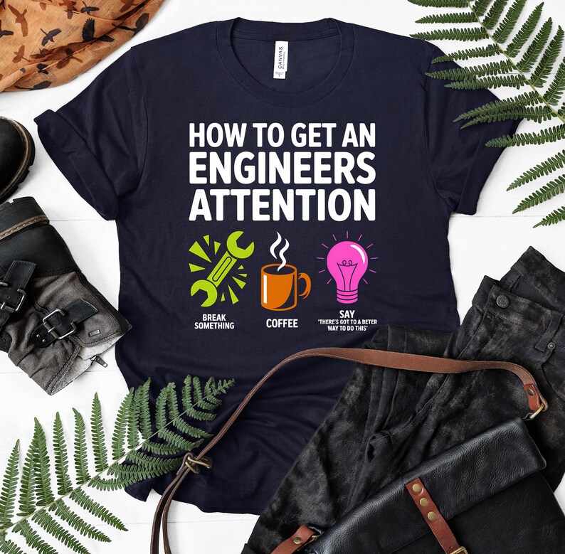 T-shirt with "How to Get an Engineer's Attention" graphic, featuring coffee and a lightbulb.