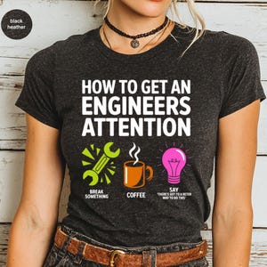 T-shirt with "How to Get an Engineers Attention" text and humorous instructions.