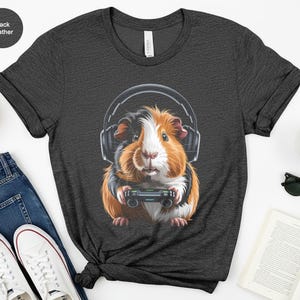 Cute Guinea Pig with Headphones Shirt, Funny Animal Graphic Tee, Pet Lover Gift, Adorable Rodent Design, Music Lover Shirt, Unisex tshirt