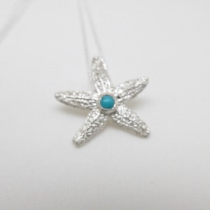 Pendentif Etoile de mer (Türkis).