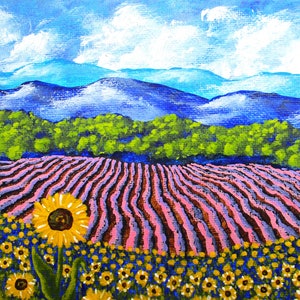 May include: A painting of a field of lavender with sunflowers in the foreground. The lavender is a light purple color and the sunflowers are yellow with brown centers. The background is a blue sky with white clouds and a row of green trees in front of a blue mountain range.