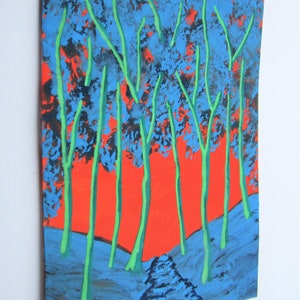 May include: A painting depicting a forest scene with tall, slender trees in shades of blue and green against a vibrant orange background. The trees are painted with a textured, brushstroke effect.