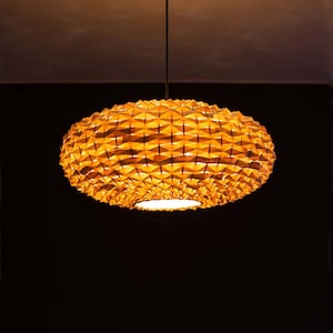 Handwoven Bamboo Pendant Light: Eco-Friendly Dining Room Lighting
