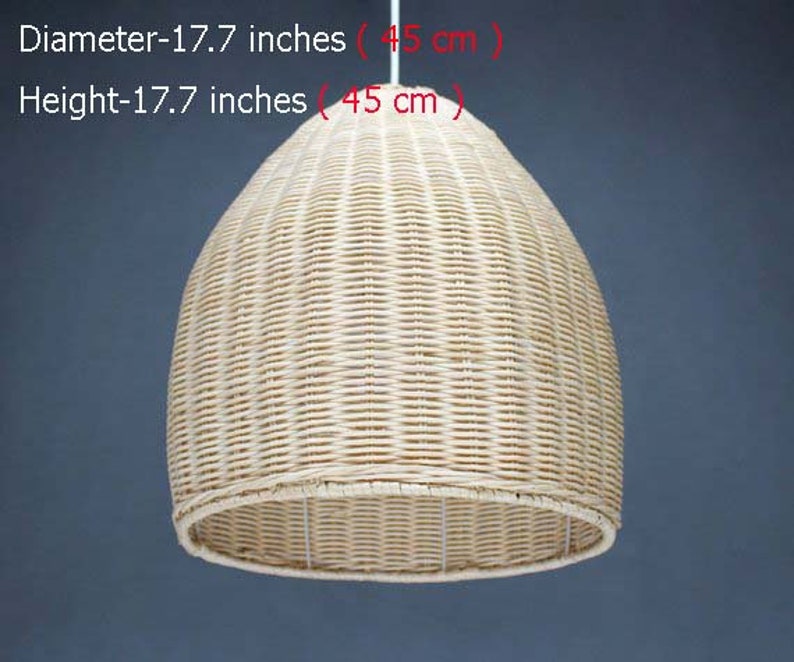 May include: A natural woven pendant light fixture made of light brown wicker. The light is 17.7 inches in diameter and 17.7 inches tall.