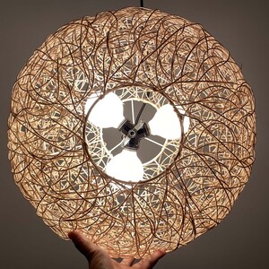 rattan pendant light
handwoven lighting
boho decor
rustic light fixture
handmade pendant
ceiling lamp
artisan lighting
eco friendly lamp
coastal chandelier
farmhouse lighting
rattan pendant light,handmade woven lampshade,  
bohemian ceiling light, eco-friendly lighting, natural fiber lamp,  
jungle decor, sustainable home decor, macrame pendant light,  
tropical chandelier, 
Chandelier
Ceiling Light Fixture
Pendant Light
Modern Chandelier
Vintage Chandelier
Rustic Chandelier
Farmhouse Chandelier